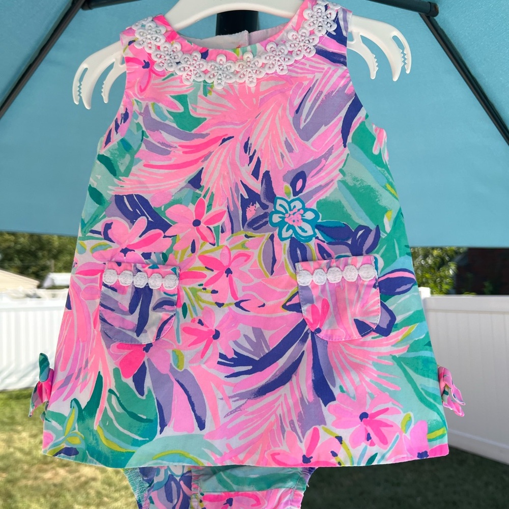 Infant dress in good used condition.  Size 6/12 MO